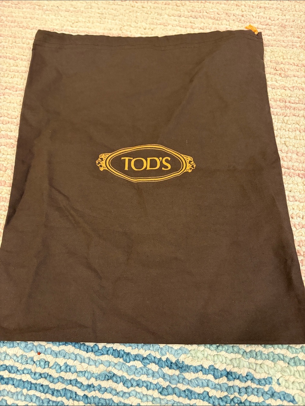 Tod's Black Dust Bag with Gold Logo
